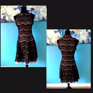 Black lace sleeveless illusion midi dress